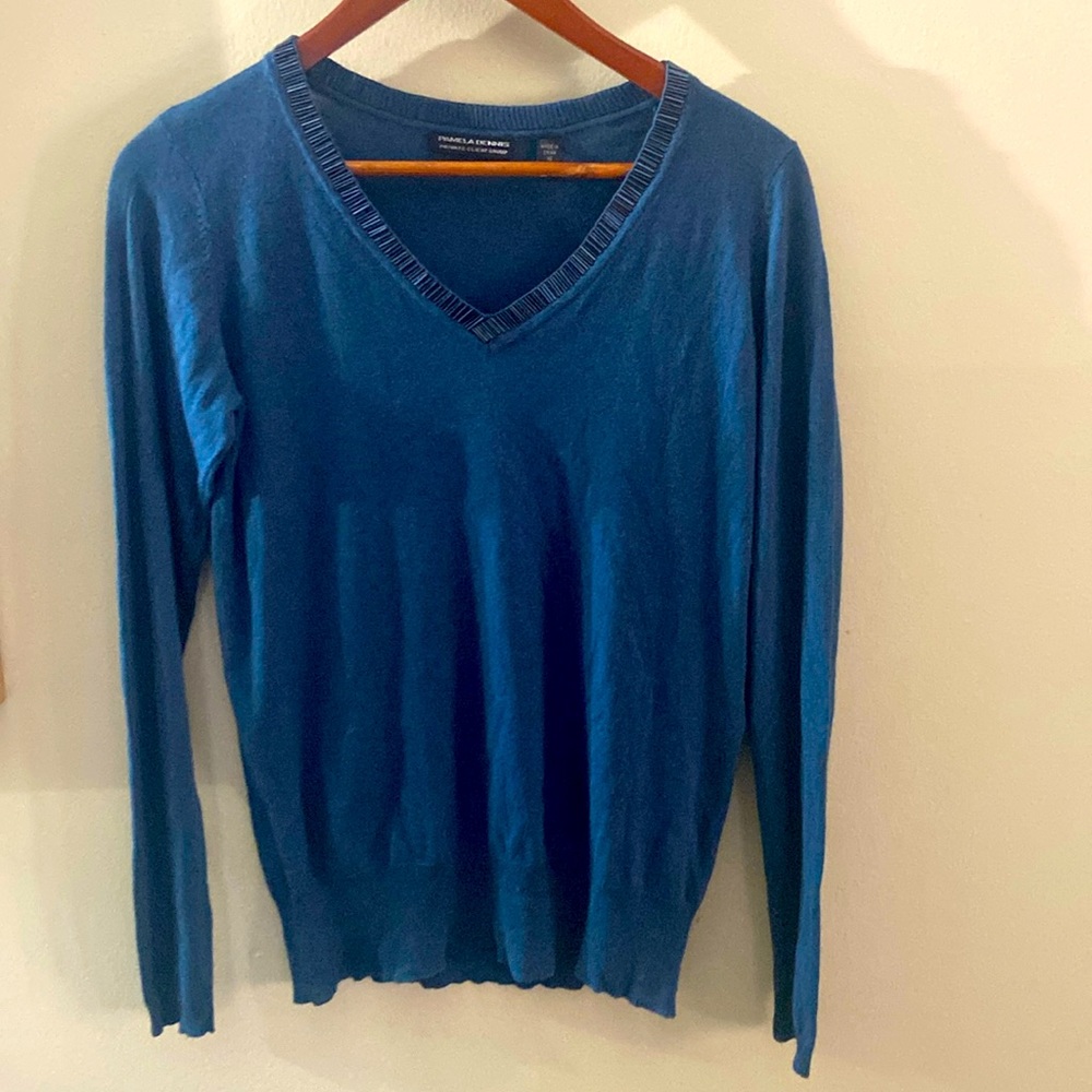 Blue long sleeve sweater size XS great condition.